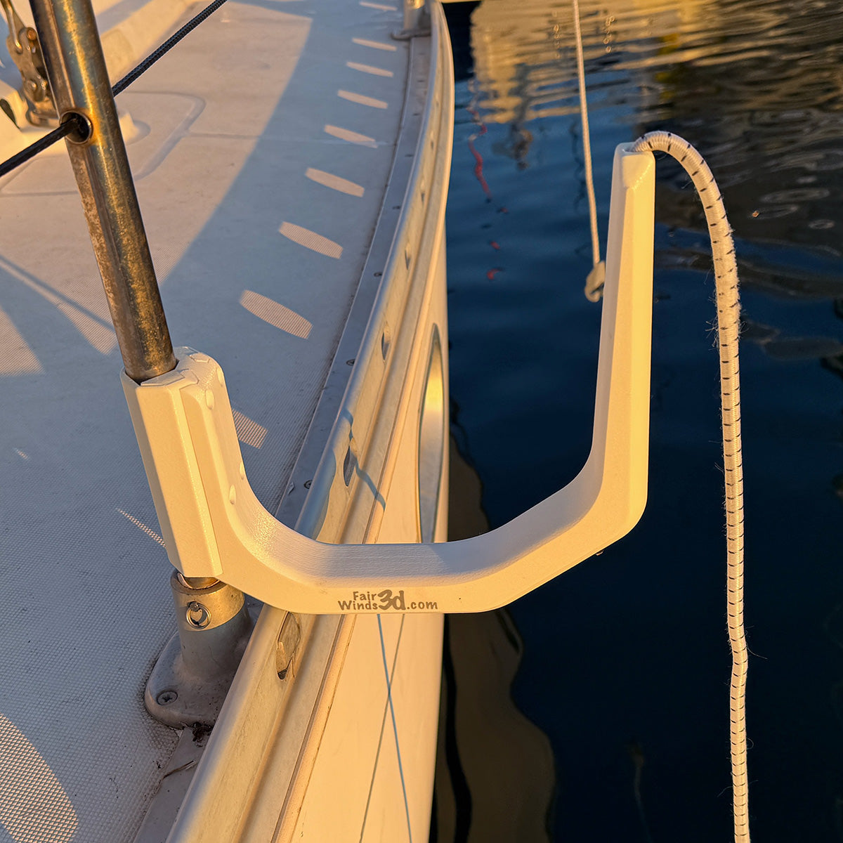 Paddle board holder on outside boat rail – secure SUP storage for motor yacht and sailboat